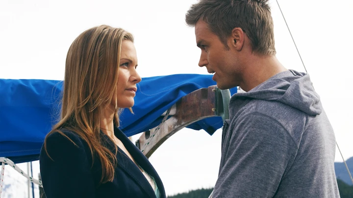 Lauren Lee Smith and Christopher Russell filming a tense scene for Seduced by His Lies in Toronto.